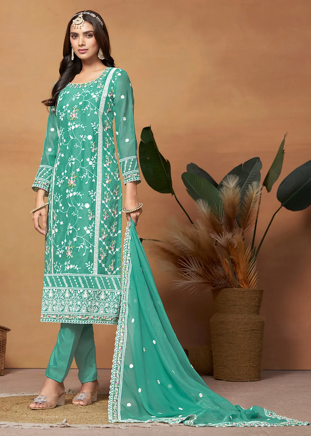 Pakistani Style Turquoise Embroidered Organza Salwar Suit