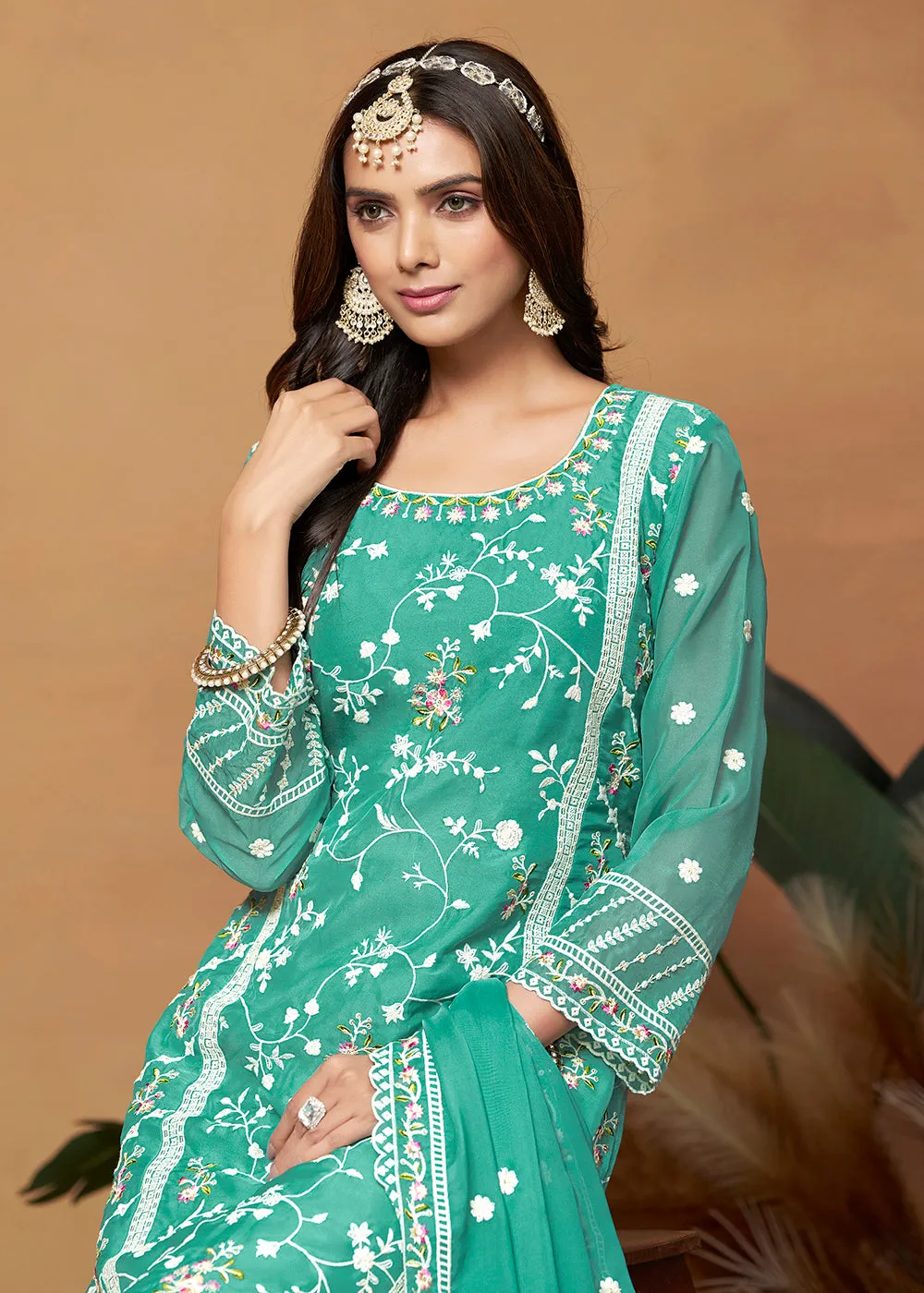 Pakistani Style Turquoise Embroidered Organza Salwar Suit